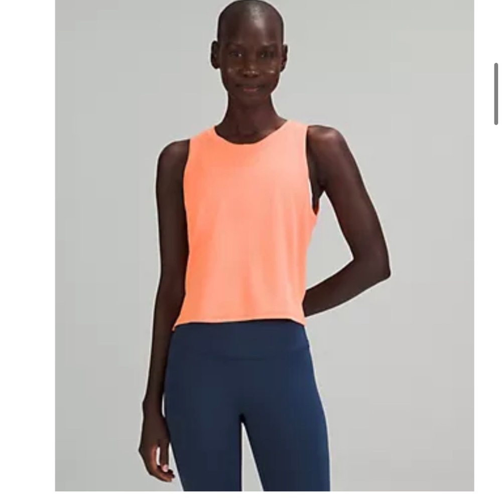 Lululemon “Train to be” tank. size 14. Orange soda